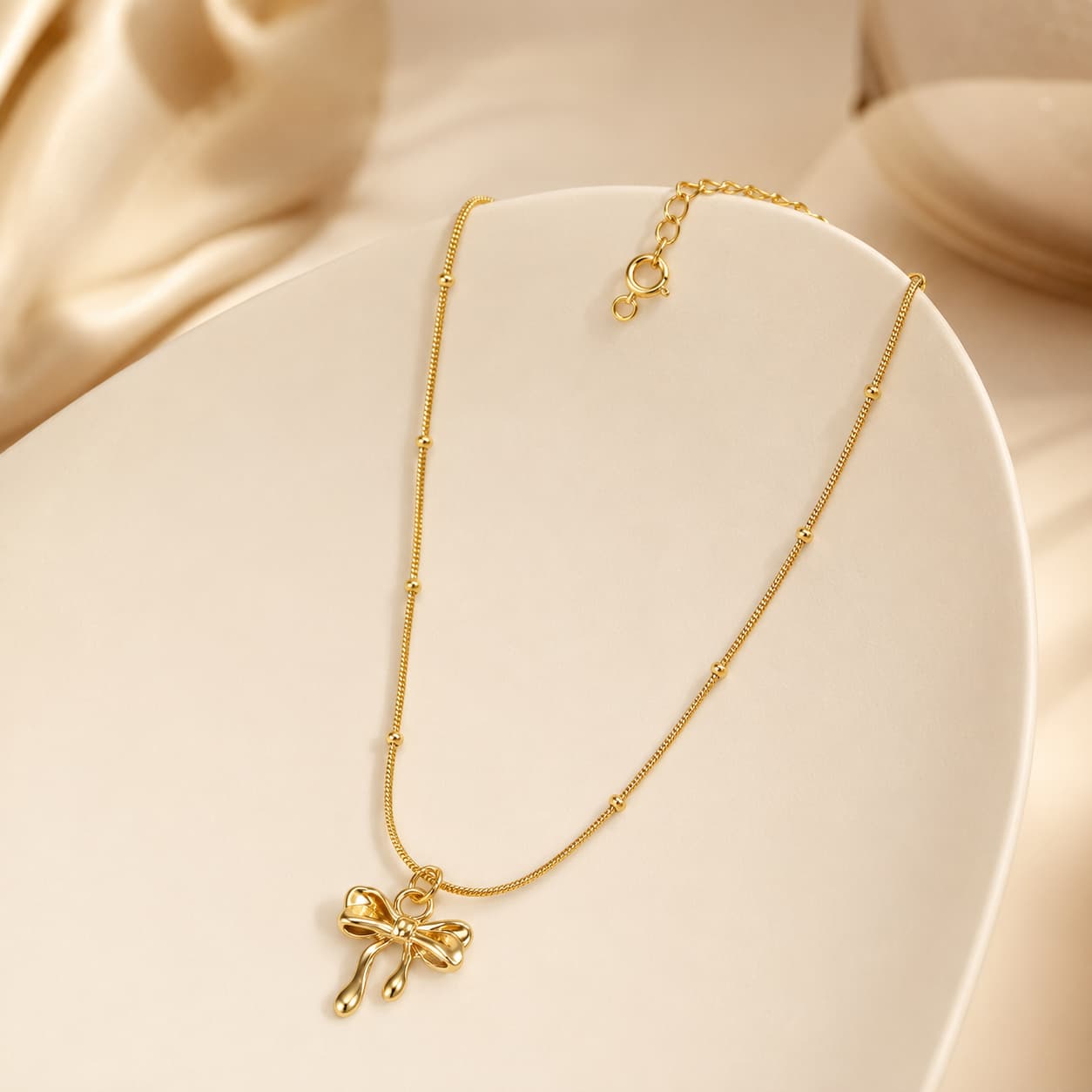 Bow-Tied Love Anti Tarnish Pendant